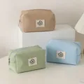 Three waffle pattern cosmetic travel bags in pastel khaki, blue, and green shades - Single 11*10*21cm / Beige Apricot