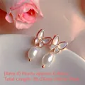 Close-up detail of butterfly-shaped earrings featuring natural pearls and silver posts - Natural Pearl / Butterfly Mother of Pearl & Freshwater Pearl Style (EH66-4)