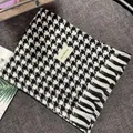 Detail showing the classic black and white houndstooth pattern and soft fringe edges - Small Houndstooth Pattern / Black & White / Over 175cm