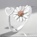 Detail view of silver-plated adjustable daisy ring with heart and orange zircons - Adjustable Open / Heart Petal Rotating Style