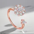 Close-up detail of an elegant rotating rose gold plated ring with sparkling zircons - Adjustable Open / Full Zirconia Rotating Style (Rose Gold)