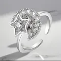 Macro view of a silver rotating ring featuring sparkling star and moon zircon details. - Adjustable Open / Star Moon Rotatable Style
