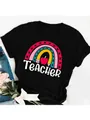 Detail of teacher-themed rainbow and pencil graphic print on black cotton T-shirt - S / Tops / Black Rainbow Apple Teacher Style (5)