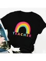 Close-up of a black women's T-shirt featuring a colorful rainbow and TEACHER print - S / Colorful Gradient Rainbow Teacher Style (18) / Black / Tops