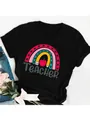 Detail of Teacher rainbow graphic print on black cotton t-shirt - S / Tops / Black Rainbow Apple Teacher Print (24)