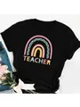 Close-up of a black cotton T-shirt featuring a colorful rainbow and Teacher print design. - S / Tops / Black Wave Rainbow Style (29)