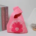 Stylish pink knitted gift wrist bag with red floral pattern and spring-themed text design - 16x28cm / Pink Base Large Red Flower