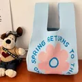 Light blue knitted wrist bag featuring a pink flower pattern and spring slogan design - 16x28cm / Sky Blue Base Large Pink Flower
