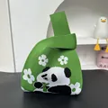 Small green knitted wrist bag featuring a cute panda and white flower pattern design. - 16x28cm / Panda Floral Green
