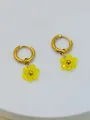 Boucles d'oreilles créoles dorées en acier avec fleurs en cristal jaune à la main - Jaune Transparent