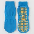 Pair of bright blue anti-slip trampoline socks with orange rubber grippy soles for yoga - Blue