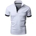 Detailansicht eines weißen Herren-Polo-Shirts mit dunkelblauem Kragen und Ärmelbündchen - S / Weiß + Schwarz
