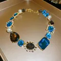 Vintage Luxus-Halskette mit blauen und rauchfarbenen Zirkonsteinen und Perlenbesatz - Halskette mit blauer Zirkonia und Kunstperle (5#) / Gold/Blau