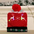 Festive red knitted Christmas beanie with glowing LED lights and reindeer motifs - Double Reindeer
