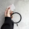 Black silicone wrist ring phone lanyard with universal translucent tether tab - Black