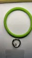 Vibrant neon green silicone phone wristlet strap with a durable silver metal ring connector - Translucent Green
