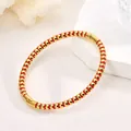 Elegant red and gold beaded stainless steel bangle with 18K gold plating for women - Red Bead Bangle