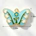 Blue enamel butterfly charm with white lily of the valley floral pattern 2.8cm - Blue Lily of the Valley Butterfly Style B