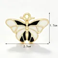 Handmade enamel butterfly pendant charm for DIY jewelry in gold, white and black - Black and White Patchwork Butterfly Style B