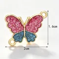 Two-tone pink and blue glitter butterfly charm accessory with 2cm x 1.6cm dimensions - Pink and Lake Blue Glitter Butterfly Connector