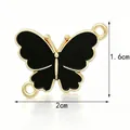 Black enamel butterfly alloy connector for DIY jewelry making measured at 2x1.6cm - Black Enamel Butterfly Connector