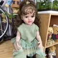 Realistic reborn doll wearing green knit outfit and tutu skirt with curly brown hair - Green Tulle Dress Rooted Hair / Doll Clothes (Outfit Only)