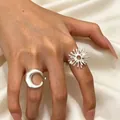 Elegant silver sun and moon adjustable open rings shown on hand with silky background - Sun and Moon Ring Set / 2 Pcs/Set / Silver