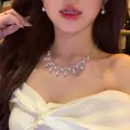 Gros plan d'un collier de perles en dentelle coréenne élégant avec boucles d'oreilles - Style 44 (Argent Double Entrelacé Perle) / Argent