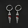 Punk style silver-tone hoop earrings featuring a geometric dangle with red faceted stone - Antique Silver Tribal Totem Red Zirconia Earrings (Pair)