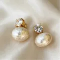 Elegant gold stud earrings with a large baroque pearl and clear round gemstone accent - Round Rhinestone Baroque Artificial Pearl Style (11854)