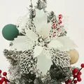 Close-up of white glitter poinsettia Christmas flower decoration with hollow leaves - White