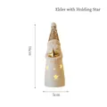 Decorative white ceramic glowing Santa Claus figurine with star cutouts height 16cm - Santa Holding Star