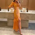 Elegante bloemen maxi-jurk in resortstijl met ruches en een hoge splitdetail - Oranje