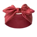 Solid red elastic headband with a cute knotted rabbit ear bow design for women - Brick Red