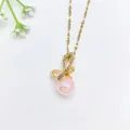 Elegant gold-plated necklace with a pink pearl and micro-pave CZ bow pendant design. - 51*xl1470-23