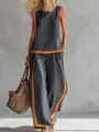 Detail of women's sleeveless contrast linen set in grey and orange for summer - S / Dark Gray