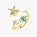 Anello dorato regolabile con stella marina e tartaruga blu, gioiello tema mare. - Aperto Regolabile / Tartaruga Marina e Stella Marina (Colore Oro) / Oro