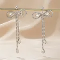 Elegant silver bow earrings with long rhinestone tassels and crystal drops - Bowknot Tassel (Silver)