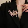Elegant pink enamel phoenix brooch with shimmering rhinestones and gold accents for blazers - Pink Rhinestone Phoenix Style (E4642)
