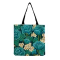 Detailed view of the elegant blue rose floral print on a dark green canvas tote bag - Dark Green with Blue Rose Print (hm5189)