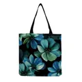 Detailed macro view of the large capacity tote bag featuring vibrant blue floral patterns - Black with Large Cyan-Blue Floral Print (hm5204)