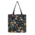 Macro detail of colorful floral patterns on a navy blue canvas shopping tote bag. - Dark Blue with Fresh Pastoral Ditsy Floral (hm5205)