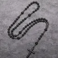 Long black bead necklace with hematite cross pendant in a religious rosary style - Black