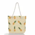 Detailed front view of women's beach tote bag with pineapple print and rope handles - Pineapple and Orange Polka Dots (ms2018c)