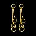 Elegant long gold tassel earrings featuring twisted circular rings on black background. - Triple Circle Style Earrings