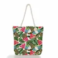 Close-up of vibrant tropical fruit print and thick rope handles on canvas beach bag - Watermelon Pineapple Monstera (ms2018e)
