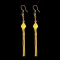 Elegant long gold tassel drop earrings featuring a stylish diamond-shaped metal plate. - Square Style Earrings