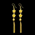 Elegant long golden dangling earrings featuring cherry blossom motifs and chain tassels - Double Flower Style Earrings