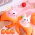 Macro view of a cute rabbit popping out of a carrot squeeze stress toy for kids - Carrot Rabbit