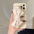 Elegant cream iPhone case featuring a large decorative bow wristband strap for girls - iPhone 7 Plus / 8 Plus / Creamy White + White Bow Wristband